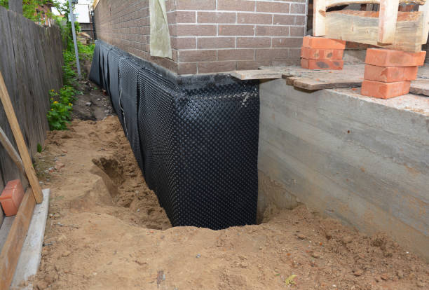 Happy homeowners after waterproofing job in Uniopolis